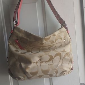 Brown and coral coach bag